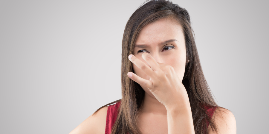 woman-holding-nose-from-bad-smell
